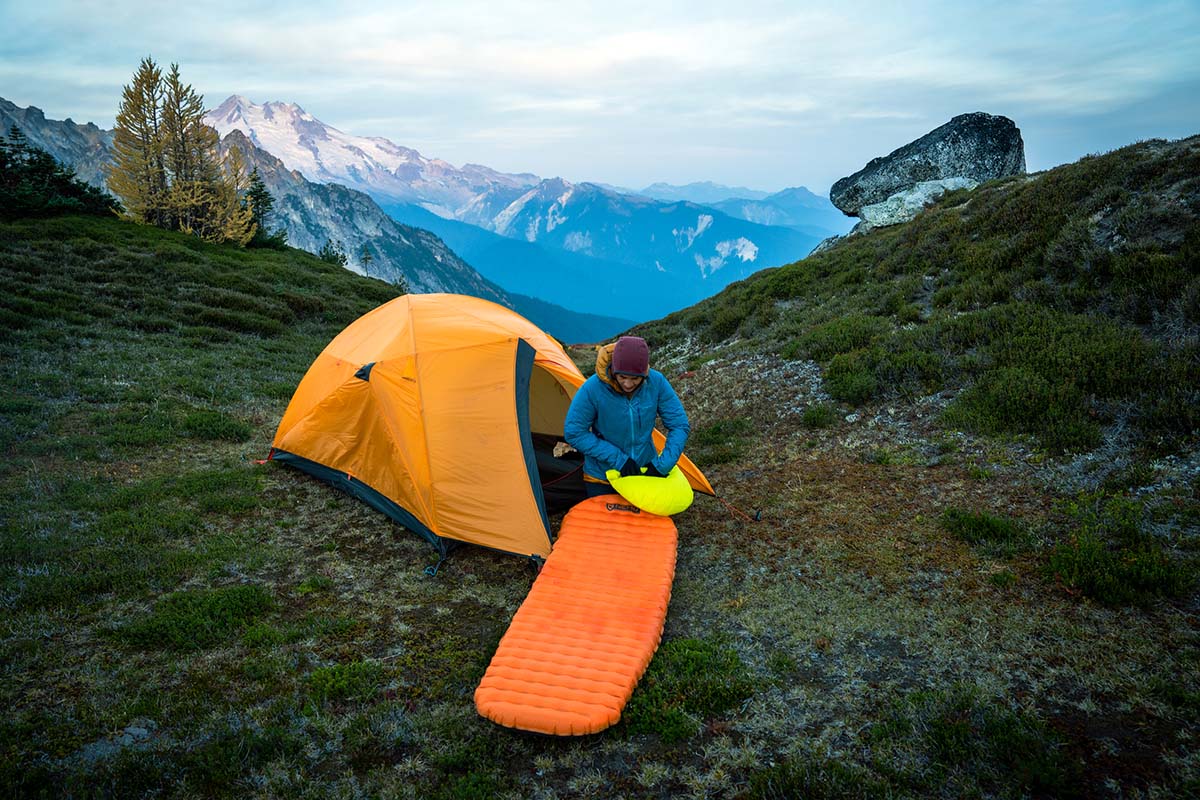 Sleeping pad (inflating Nemo pad at camp)